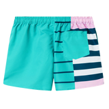 The Uglies Harletic Short by Canterbury features a turquoise left side, a navy-and-white striped right side with pink accents, and a turquoise back pocket, taking inspiration from classic Canterbury Harletic shorts.