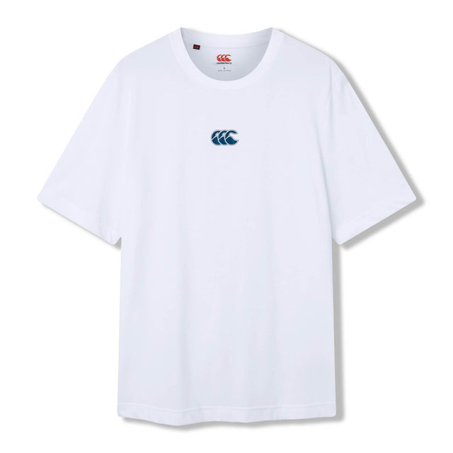 The Canterbury Tempo+ GFX Training T-Shirt is a plain white short-sleeve rugby training tee featuring a blue Canterbury logo centered on the chest, shown against a white background. This lightweight t-shirt from Canterbury’s sportswear range is designed for comfort and performance.