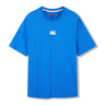 The Canterbury Tempo+ GFX Training T-Shirt is a plain blue short-sleeve sports tee featuring a small white Canterbury logo centered on the chest, shown against a white background.