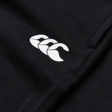 Close-up of black fabric from the Canterbury Rakaia 2.0 Fleece Pant, featuring a white Canterbury logo and seam detailing.