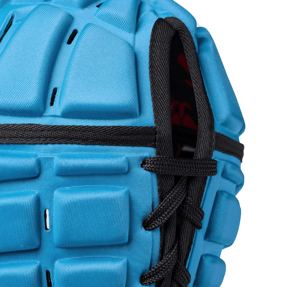 Close-up view of a blue sports Canterbury Raze Headguard with Canterbury branding and black laces.