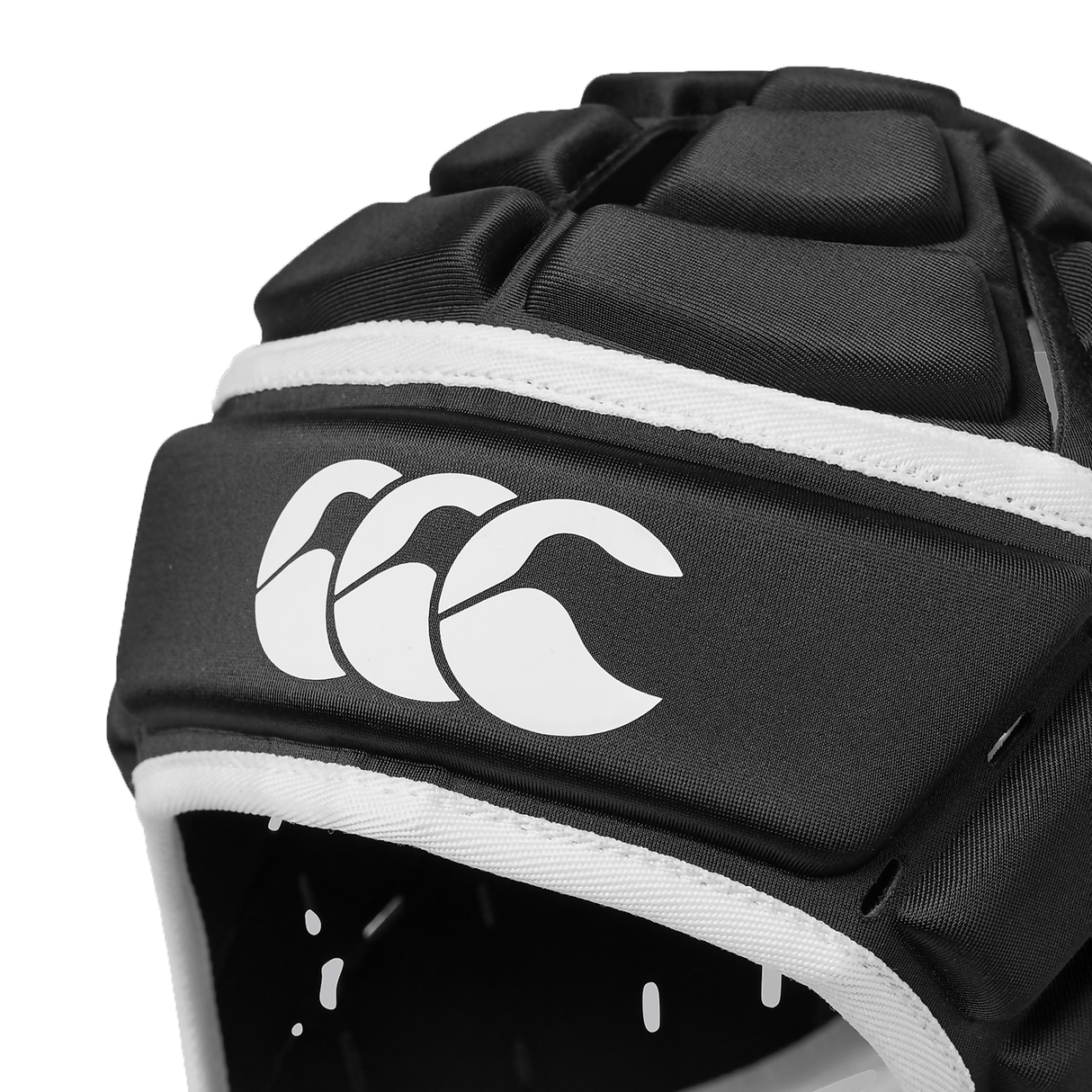 A close up of a black and white Canterbury Core Headguard by Canterbury.