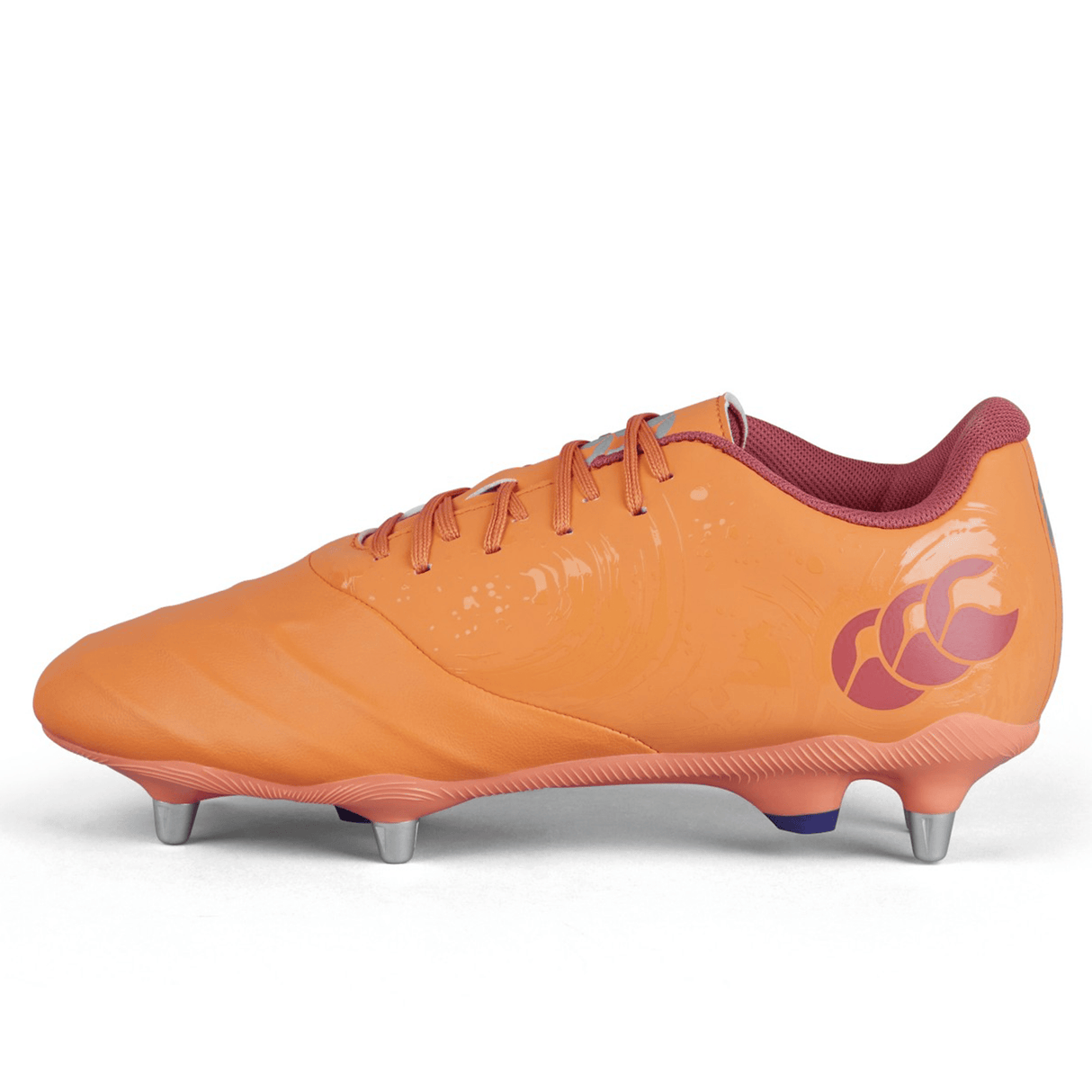 An individual Canterbury Phoenix Genesis Pro SG rugby cleat in Orange Crush, Amber Yellow, and Mars Dust colorway, featuring maroon accents. It comes laced up and is designed with metal studs on the sole to provide ultimate traction on soft ground.