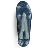Bottom view of the Canterbury Speed Infinite Elite SG soccer cleat, showcasing a translucent sole with six strategically placed cleats for optimal traction in a refined Black/Silver Metallic design.