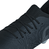 Close-up of the Canterbury Speed Infinite Elite SG - Black/Silver Metallic athletic shoe by Canterbury, showcasing its lace-up design, textured details, and patterned Black/Silver Metallic surface.