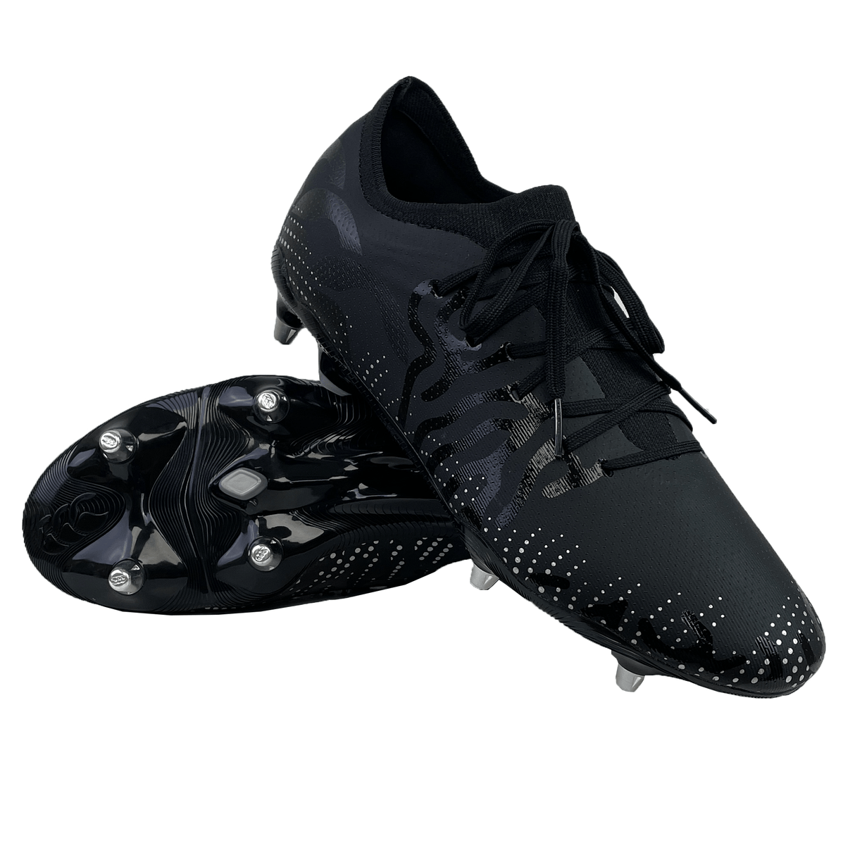 A pair of black and silver metallic Canterbury Speed Infinite Pro SG rugby boots, one shoe standing upright and the other lying on its side displaying the sole, reminiscent of the lightweight design featuring a TPU mesh upper.