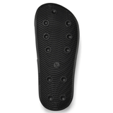 The image displays the bottom of the Canterbury Wide Fit Slide - Black, featuring several evenly spaced circular treads for grip and a size marking indicating 9/10, making it an ideal choice for all-day comfort.