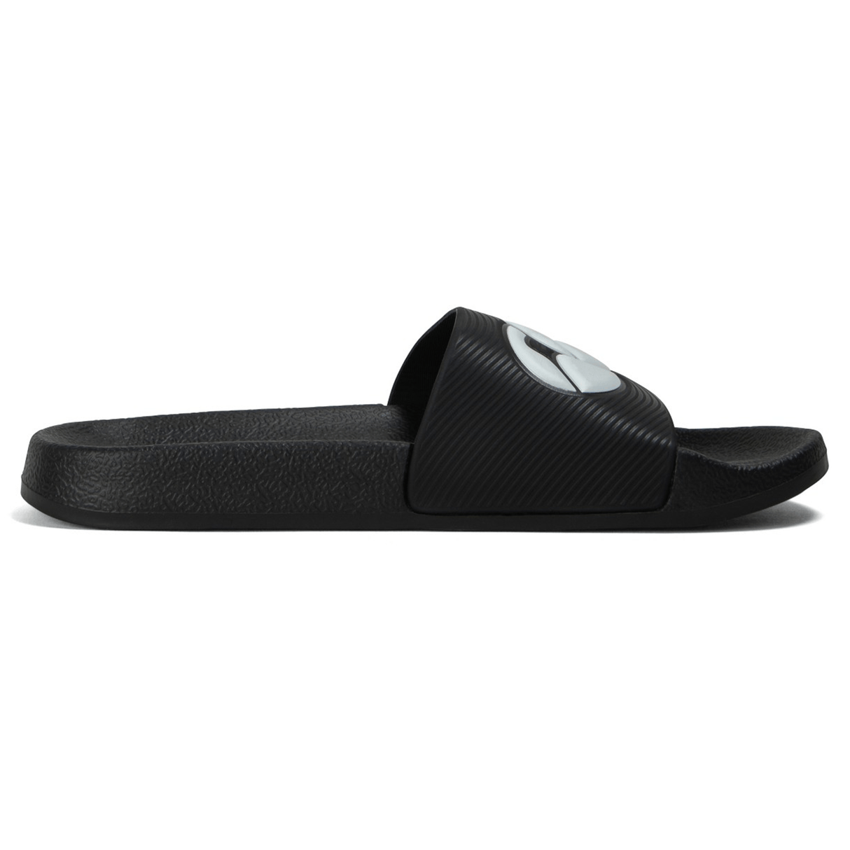 The Canterbury Wide Fit Slide - Black by Canterbury features a single wide strap with a round white logo, designed for all-day comfort.