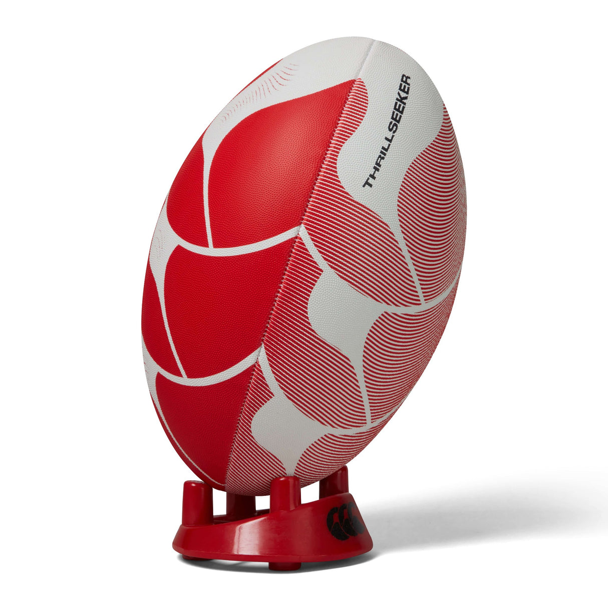 Red and white Canterbury Thrillseeker Play Rugby Ball on a stand against a white background.