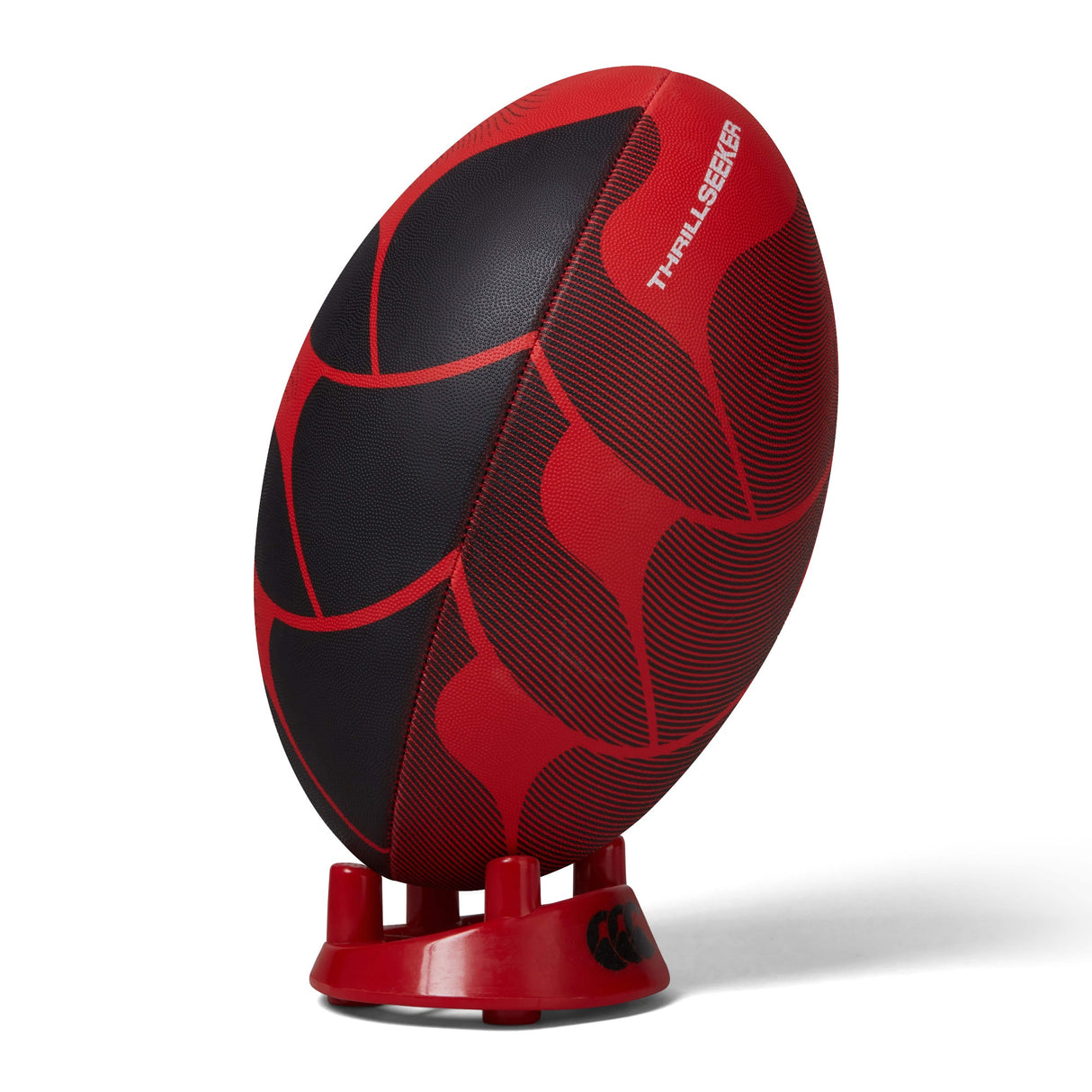 A red and black Canterbury Thrillseeker Play Rugby Ball on a stand against a white background.