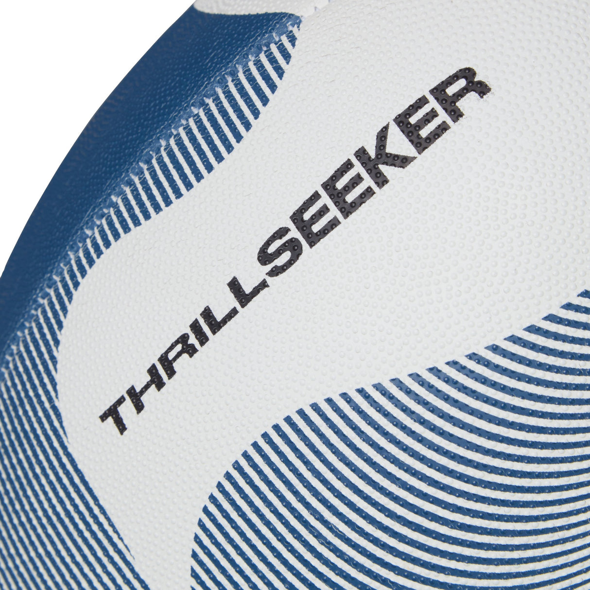 Close-up of a textured Canterbury Thrillseeker Play Rugby Ball with the words "Canterbury Thrillseeker" printed on it.