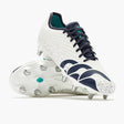 The Canterbury Stampede Groundbreak Pro SG AU-WHITE/BALTIC GREEN rugby boots by Canterbury, featuring a white base with Baltic green accents, metal studs, and a speckled design, are displayed on a plain background—these premium soft ground boots deliver the grip and support needed for scrum specialists.