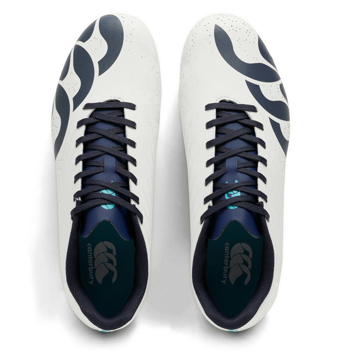 A pair of Canterbury Stampede Groundbreak Team SG AU-WHITE/BALTIC GREEN rugby boots are shown from above, styled as white athletic shoes with Baltic green laces and large, bold Baltic green abstract patterns on the sides.