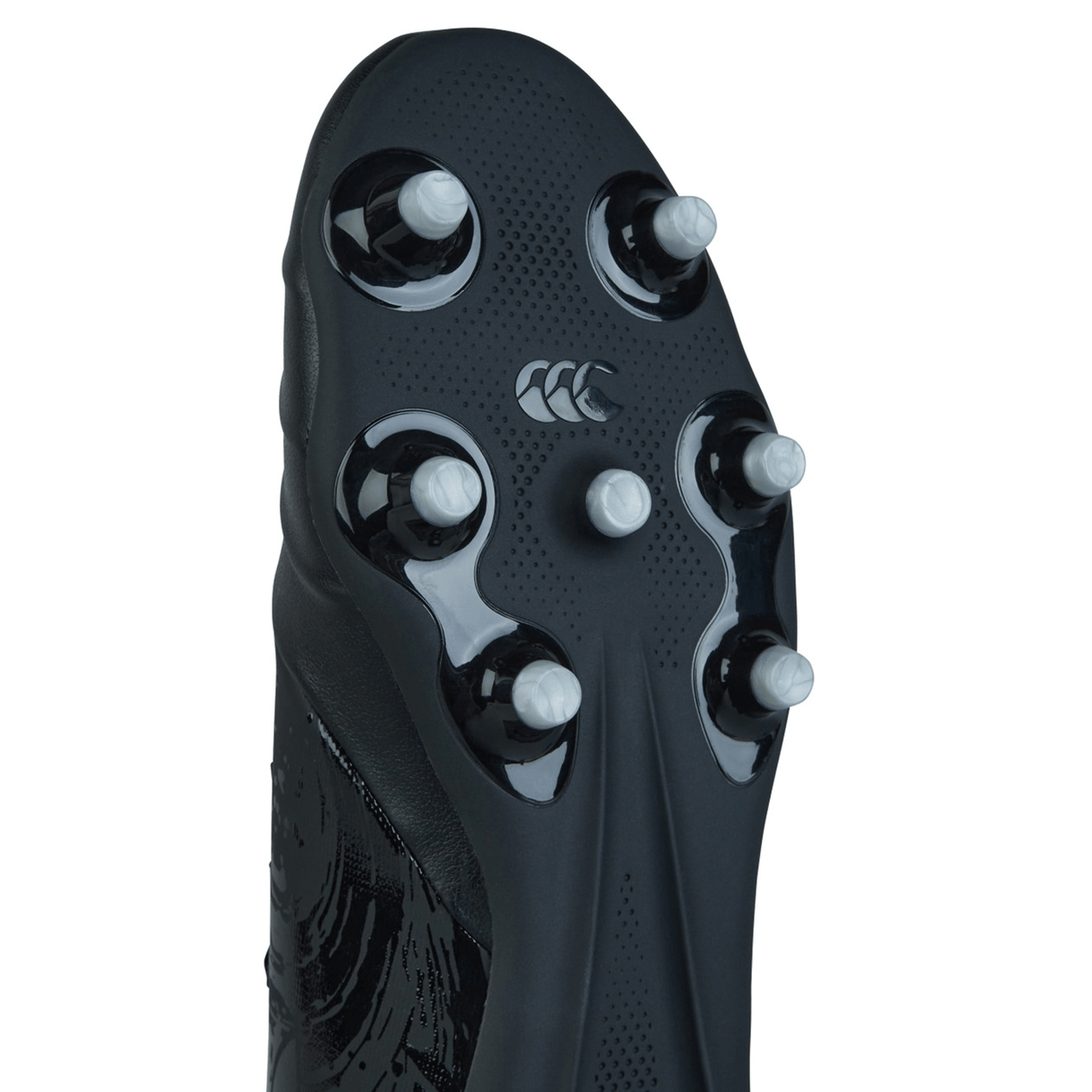 Close-up of the sole of a Canterbury Phoenix Genesis Pro FG rugby boot in Black/Silver Metallic, featuring six white studs and the Canterbury logo, highlighting its firm-ground design.