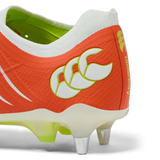 Close-up of the heel of the Canterbury Phoenix 2.0 Elite SG rugby boot in Tangerine Tango/Snow White, showing metal studs and Canterbury branding.