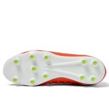 Bottom view of the Canterbury Phoenix 2.0 Pro FG - Tangerine Tango/Snow White by Canterbury, featuring a Snow White sole with twelve green-tipped studs and a striking Tangerine Tango upper.