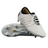 The Canterbury Phoenix 2.0 Team SG rugby boots by Canterbury feature a white design with black accents, metal studs, and a branded heel; one boot is upright while the other shows its sole.