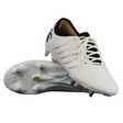 The Canterbury Phoenix 2.0 Team SG rugby boots by Canterbury feature a white design with black accents, metal studs, and a branded heel; one boot is upright while the other shows its sole.