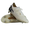 The Canterbury Speed Falcon Elite SG boots in white feature black accents, metal sole studs, and white laces. One boot is upright and the other sole-up—perfect for soccer or rugby.