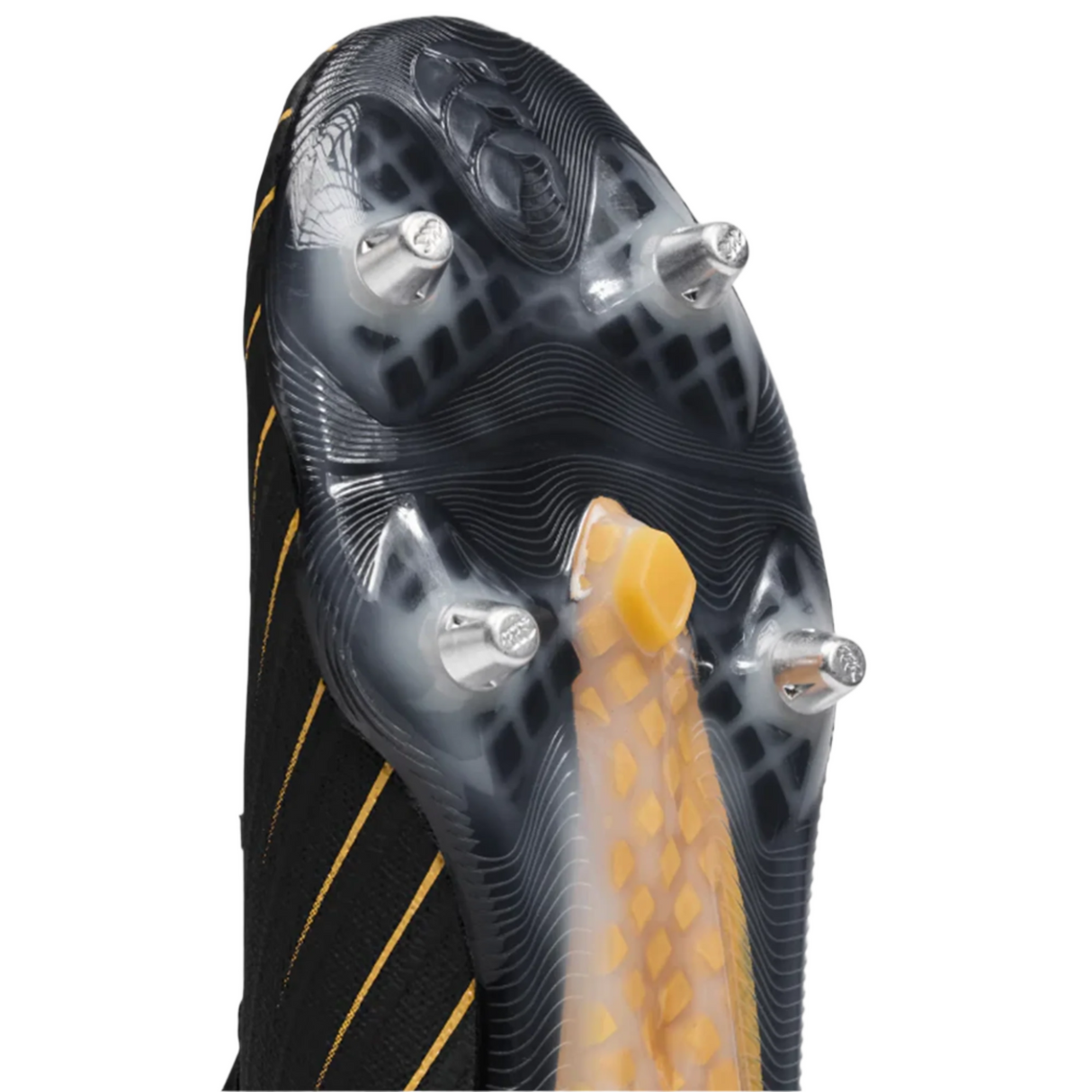 Close-up of the sole of the Canterbury Speed Falcon Elite SG, showing metal studs, a textured yellow midfoot support, and a black upper with yellow stripes.