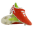 The Canterbury Speed Falcon Elite SG rugby boots in Tangerine Tango/Snow White feature metal studs, white accents and laces, a white and green inner lining, and are shown on a white background.