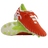 A pair of Canterbury Speed Falcon Elite FG football boots in Tangerine Tango/Snow White, featuring white accents, neon green studs, and white laces, displayed on a white background.