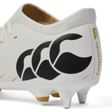Close-up of the Canterbury Speed Falcon Pro SG - White, a lightweight rugby boot with black Canterbury logo and gold branding on the heel, featuring metal studs for optimal soft ground performance.