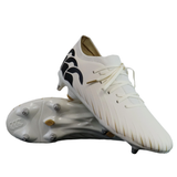 A pair of Canterbury Speed Falcon Pro SG - White rugby boots, featuring black wave accents on the heel and gold-tipped laces, with one shoe displayed atop the other.