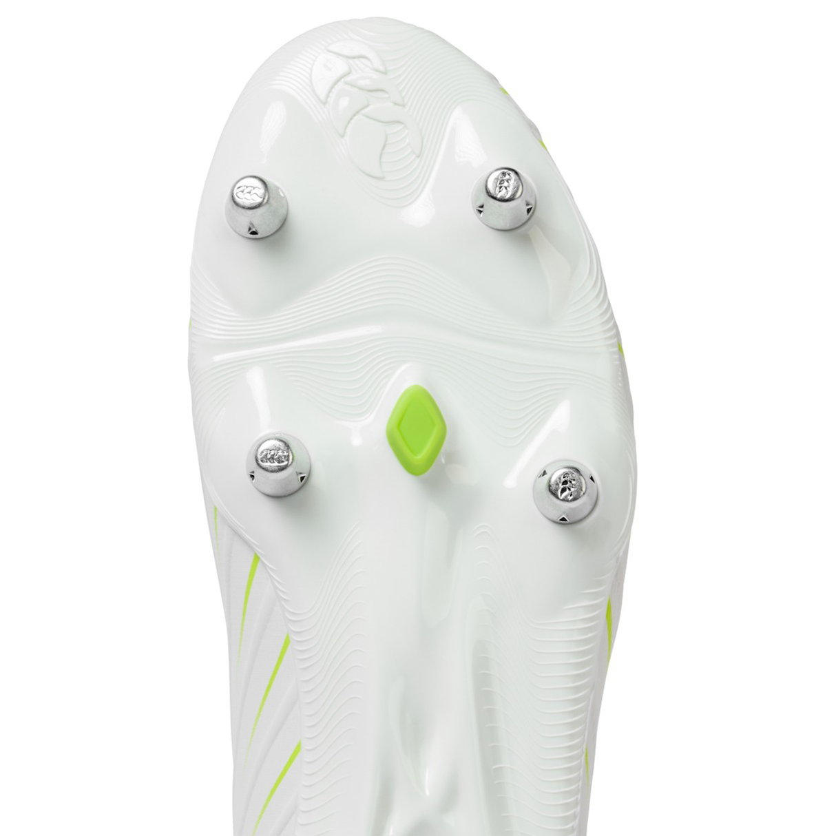Close-up of the Canterbury Speed Falcon Pro SG sole in Snow White/Tangerine Tango, showing four metal studs and a bold green and Tangerine Tango accent at the center.