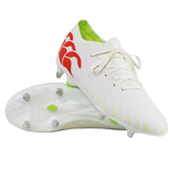 The Canterbury Speed Falcon Pro SG rugby cleats in Snow White/Tangerine Tango feature red logo accents, a neon green interior, and metal studs, displayed against a white background.