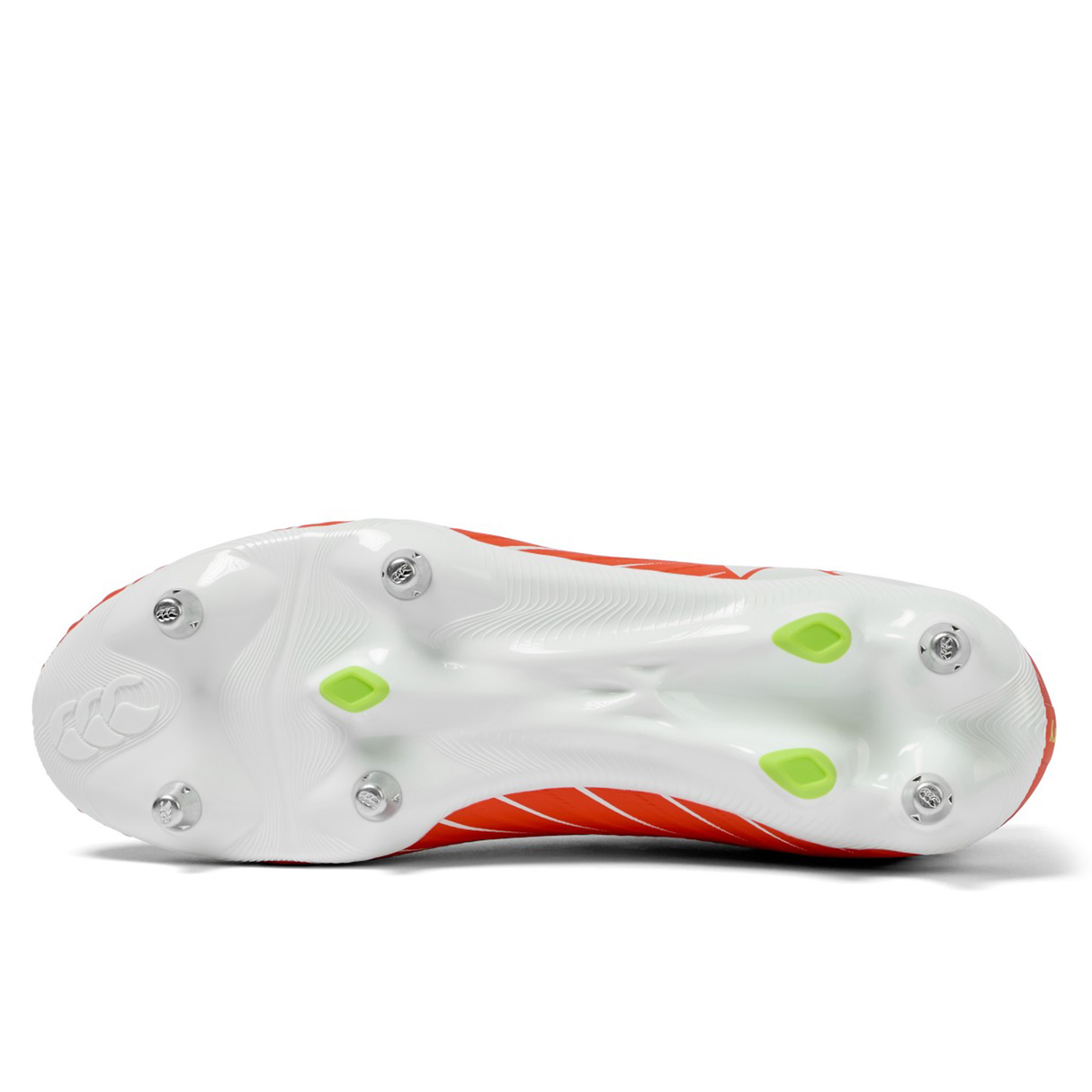 Bottom view of the Canterbury Speed Falcon Pro SG rugby boot in Tangerine Tango/Snow White, featuring a lightweight sole with metal/plastic studs, green accents, textured grip pattern—ideal for agile players.