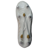 Bottom view of the Canterbury Speed Falcon Team SG - White, featuring six metal studs and two beige traction elements—crafted by Canterbury for superior grip on soft ground, just like classic rugby boots.