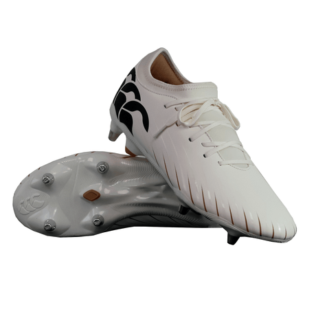 The Canterbury Speed Falcon Team SG - White rugby boots from Canterbury feature black accents, a stylized black heel logo, and metal studs—ideal for top performance on soft ground.