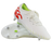 A pair of Canterbury Speed Falcon Team SG soccer cleats in Snow White/Tangerine Tango, featuring a red logo, neon green interior, and metal studs; one shoe stands upright while the other shows its sole.