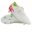 A pair of Canterbury Speed Falcon Team SG soccer cleats in Snow White/Tangerine Tango, featuring a red logo, neon green interior, and metal studs; one shoe stands upright while the other shows its sole.
