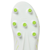 Close-up of the sole of a Canterbury Speed Falcon Team FG soccer cleat in Snow White/Tangerine Tango, highlighting seven green-tipped studs in a circular pattern.