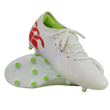 A pair of Canterbury Speed Falcon Team FG soccer cleats in Snow White/Tangerine Tango, featuring green studs, a lime green interior, and tangerine red heel accents, displayed against a white background.