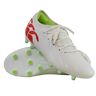 A pair of Canterbury Speed Falcon Team FG soccer cleats in Snow White/Tangerine Tango, featuring green studs, a lime green interior, and tangerine red heel accents, displayed against a white background.