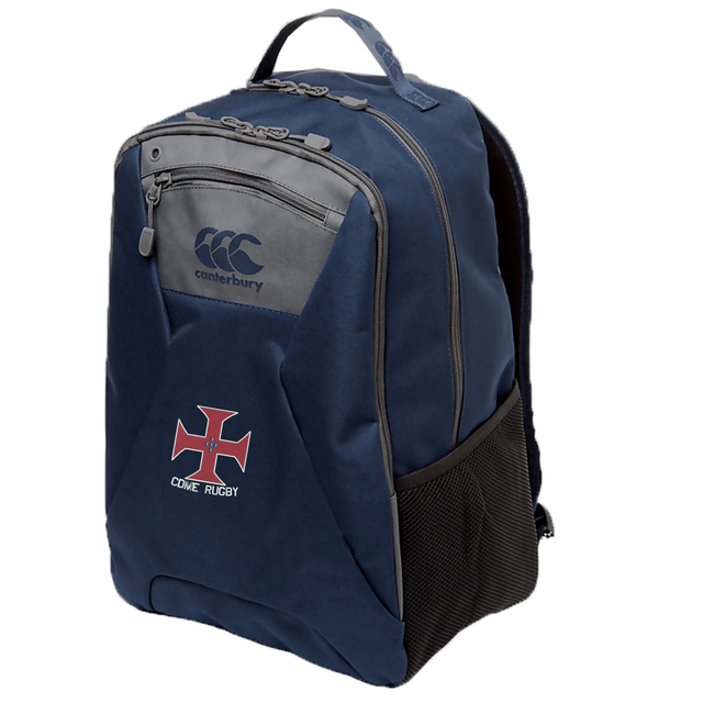 The SF CDME Rugby Medium Backpack by EMB Canterbury is a navy blue medium backpack featuring a front pocket, side mesh pocket, and top handle. Adorned with a red and white rugby emblem and the "COME RUGBY" text on the front, this water repellent backpack also includes a padded laptop pocket for extra convenience and protection.