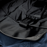 A close up of a Canterbury Medium Backpack with a tag on it.