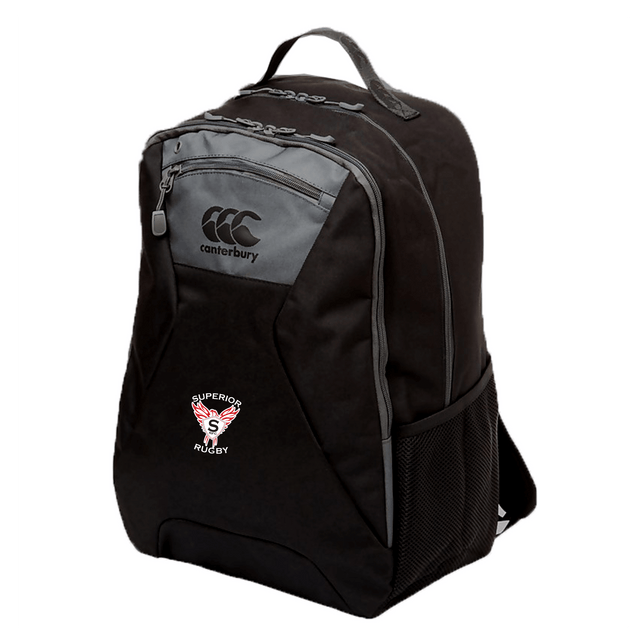 The Superior Rugby Club Medium Backpack by EMB Canterbury is black, with a front zipper pocket, side mesh pocket, padded laptop pocket, and a "Superior Rugby" logo patch on the front.