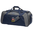 The CenCal Youth Bullard Holdall Duffle Bag by Canterbury, available in dark blue and gray, showcases a coat of arms logo on the side. It includes two roomy compartments and an adjustable padded shoulder strap. Crafted to be water-repellent, this bag from EMB Canterbury is ideal for safeguarding your belongings in any weather condition.
