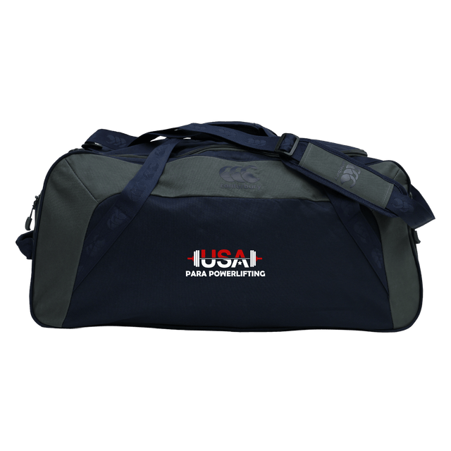 The USA Para Powerlifting Holdall Duffle Bag by EMB Canterbury features a dark blue and gray, water-repellent design with "USA Para Powerlifting" and a barbell graphic, blending rugby-level durability with athletic style.