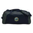Navy and dark grey Media Unified Rugby Holdall Duffle Bag by Canterbury with a shoulder strap and a crest on the side.