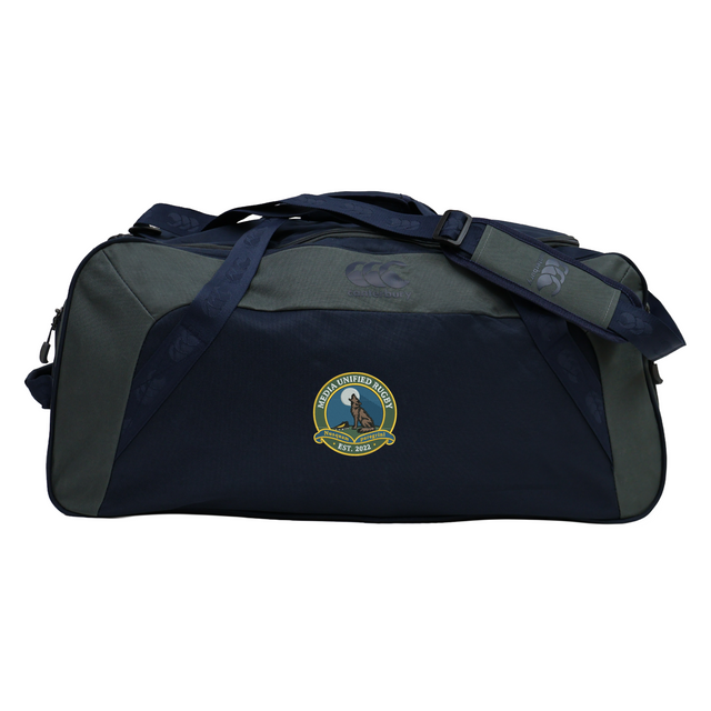 Navy and dark grey Media Unified Rugby Holdall Duffle Bag by Canterbury with a shoulder strap and a crest on the side.
