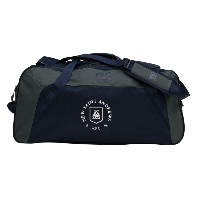 Introducing the New Saint Andrews College Holdall Duffle Bag by Canterbury, a durable and water-repellent rugby holdall from EMB Canterbury. This navy and gray gym bag features “New Saint Andrews RFC” and a distinctive white logo printed on the front pocket, making it the perfect choice for protecting and organizing your gear.