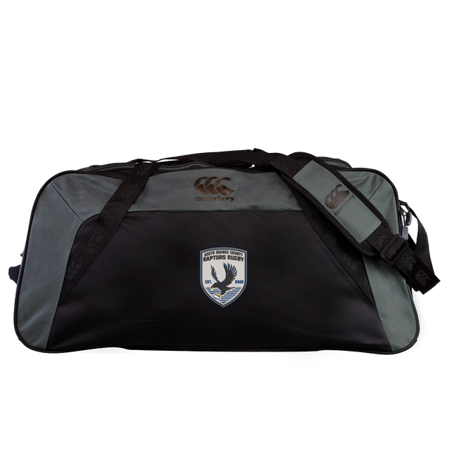 The South Orange County Raptors Holdall Duffle Bag by EMB Canterbury is a black and gray water-repellent sports bag with shoulder straps, featuring the Canterbury logo and an embroidered South Orange County Raptors eagle patch with text on the front.