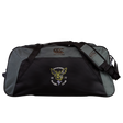 The Hornets Rugby Club 1977 Holdall Duffle Bag by EMB Canterbury is a large black and gray sports bag featuring the “Hornets Rugby Club 1977” logo and a yellow hornet emblem on the front pocket. This water-repellent holdall includes an adjustable shoulder strap for comfortable carrying.