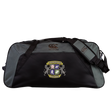 The Winchester Cannons Holdall Duffle Bag by EMB Canterbury features a black and gray design, club crest, padded shoulder strap, and water-repellent fabric—ideal for carrying your rugby gear.