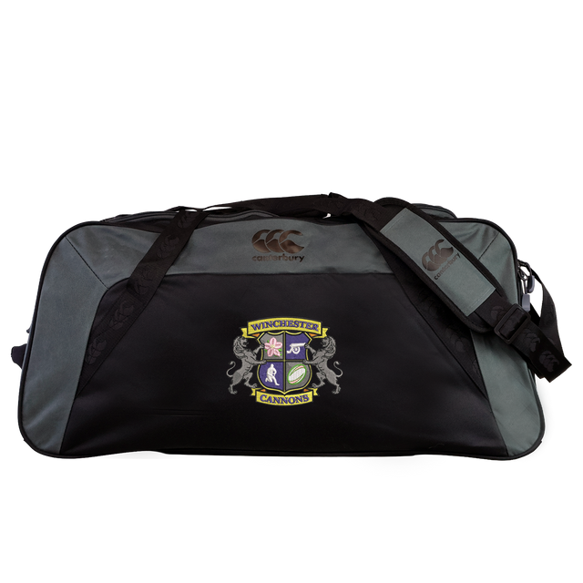 The Winchester Cannons Holdall Duffle Bag by EMB Canterbury features a black and gray design, club crest, padded shoulder strap, and water-repellent fabric—ideal for carrying your rugby gear.